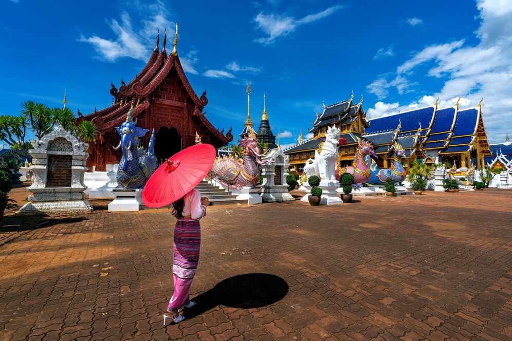 asian-women-wearing-thai-dress-costume-traditional-according-thai-culture-temple-chiang-mai_335224-1147